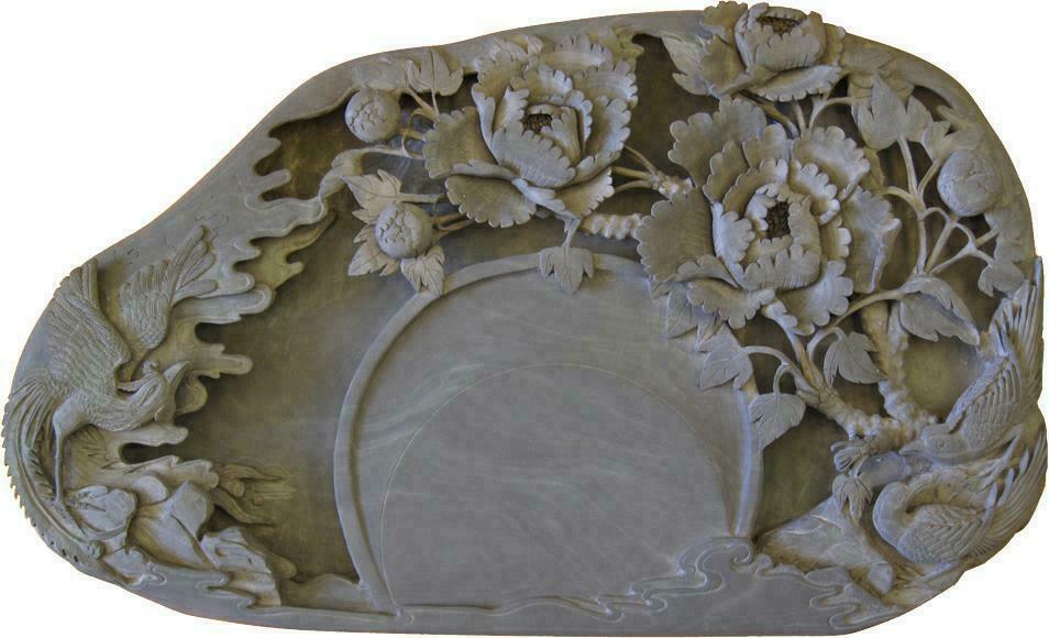 摘要附图摘要1.外观设计产品的名称:砚台(凤穿牡丹).2.